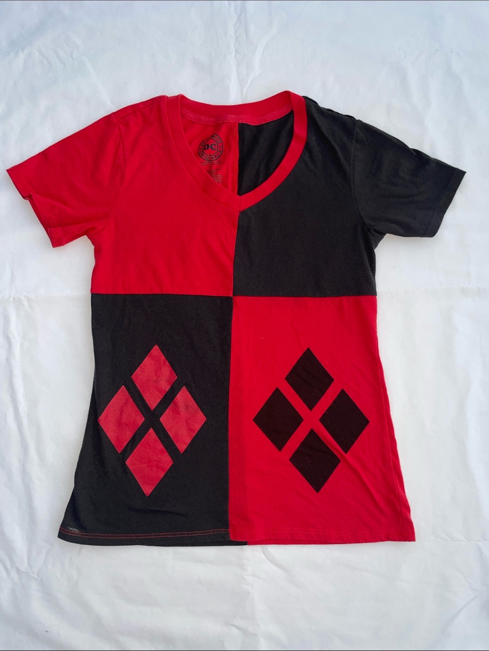 DC Comics Red and Black Quartered V-Neck Tee